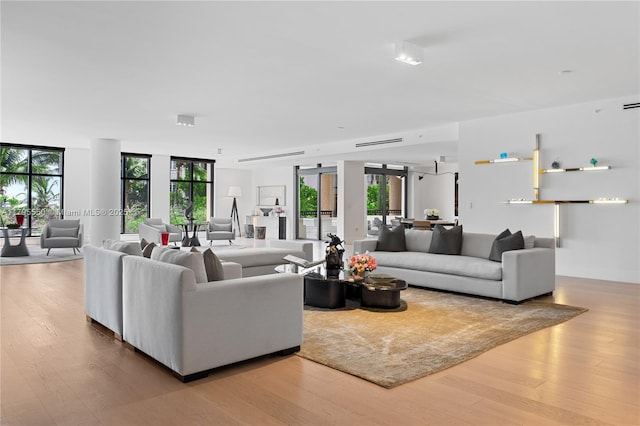 7025 Fisher Island Dr Unit 7025, Miami Beach, FL 33109 - living area with wood finished floors and healthy amount of natural light
