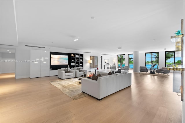 7025 Fisher Island Dr Unit 7025, Miami Beach, FL 33109 - living area with light wood-style flooring