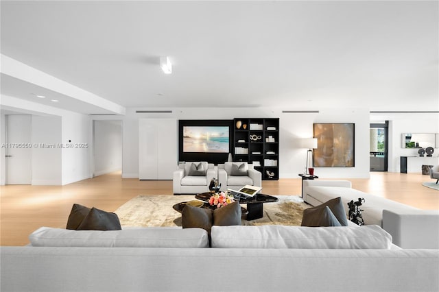 7025 Fisher Island Dr Unit 7025, Miami Beach, FL 33109 - living room featuring wood finished floors