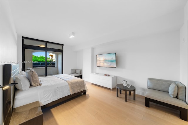 7025 Fisher Island Dr Unit 7025, Miami Beach, FL 33109 - bedroom with light wood-type flooring