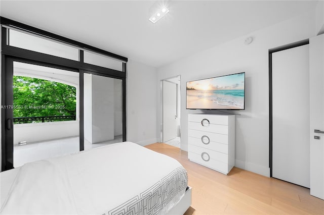 7025 Fisher Island Dr Unit 7025, Miami Beach, FL 33109 - bedroom with light wood finished floors and baseboards