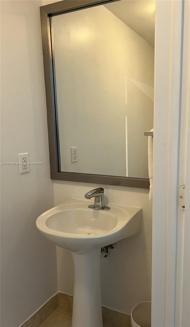 90 SW 3rd St Unit 1514, Miami, FL 33130 - bathroom featuring baseboards, tile patterned flooring, and a sink