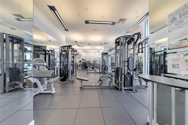 exercise room featuring visible vents