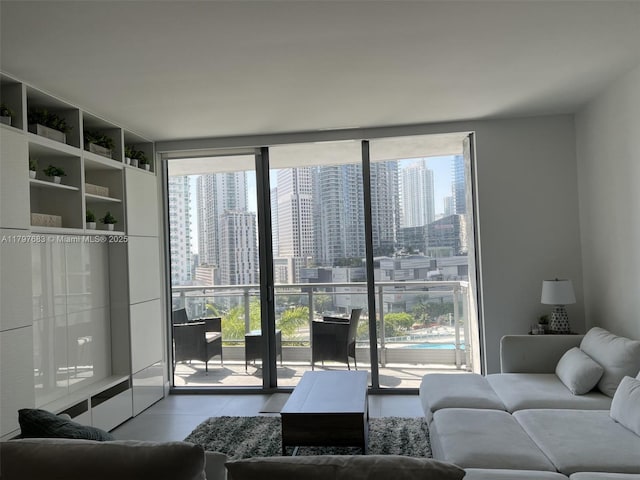 90 SW 3rd St Unit 1514, Miami, FL 33130 - living room with floor to ceiling windows, a city view, and tile patterned floors