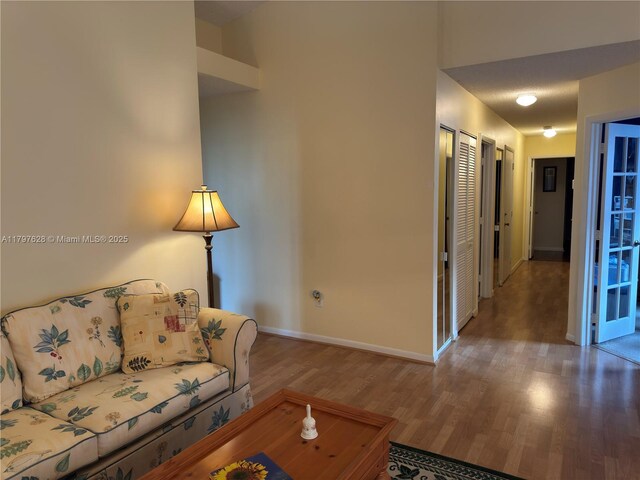 15773 NW 16th Ct, Pembroke Pines, FL 33028 - living area featuring wood finished floors and baseboards