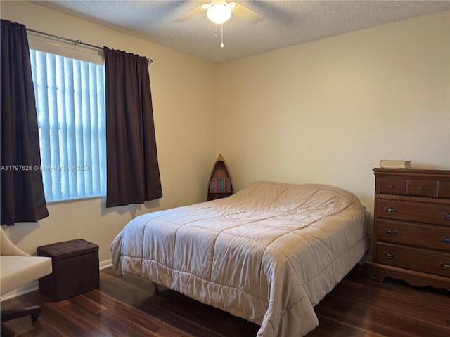 15773 NW 16th Ct, Pembroke Pines, FL 33028 - bedroom with wood finished floors, baseboards, a textured ceiling, and ceiling fan