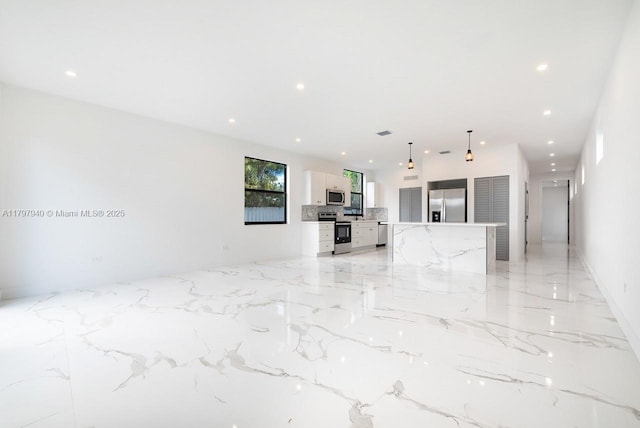 2330 SW 14th St, Miami, FL 33145 - unfurnished living room with recessed lighting