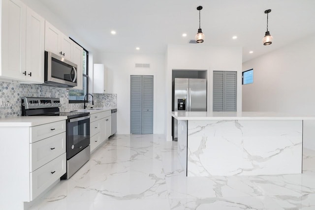 2330 SW 14th St, Miami, FL 33145 - kitchen featuring a sink, stainless steel appliances, visible vents, recessed lighting, and backsplash