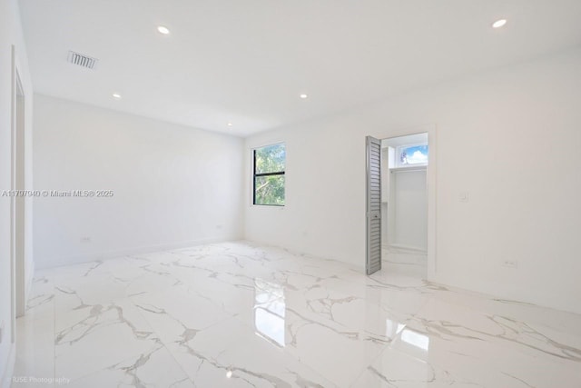 2330 SW 14th St, Miami, FL 33145 - empty room with visible vents, marble finish floor, and recessed lighting