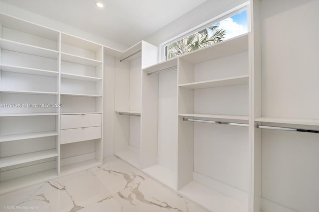 2330 SW 14th St, Miami, FL 33145 - walk in closet featuring marble finish floor