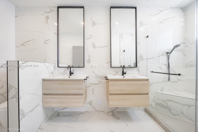 2330 SW 14th St, Miami, FL 33145 - bathroom featuring vanity, stone wall, and marble finish floor
