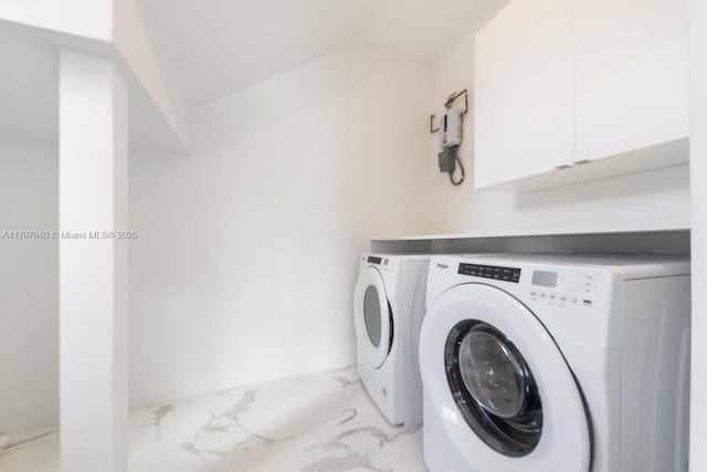 2330 SW 14th St, Miami, FL 33145 - washroom featuring light marble finish flooring, independent washer and dryer, and cabinet space