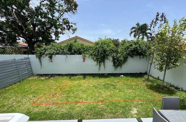 2330 SW 14th St, Miami, FL 33145 - view of yard featuring a fenced backyard