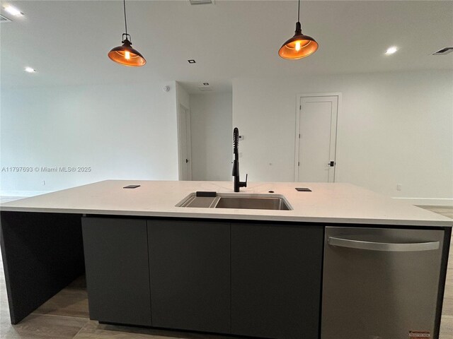 1611 SW 30th Ave, Fort Lauderdale, FL 33312 - kitchen featuring a center island with sink, a sink, pendant lighting, and stainless steel dishwasher