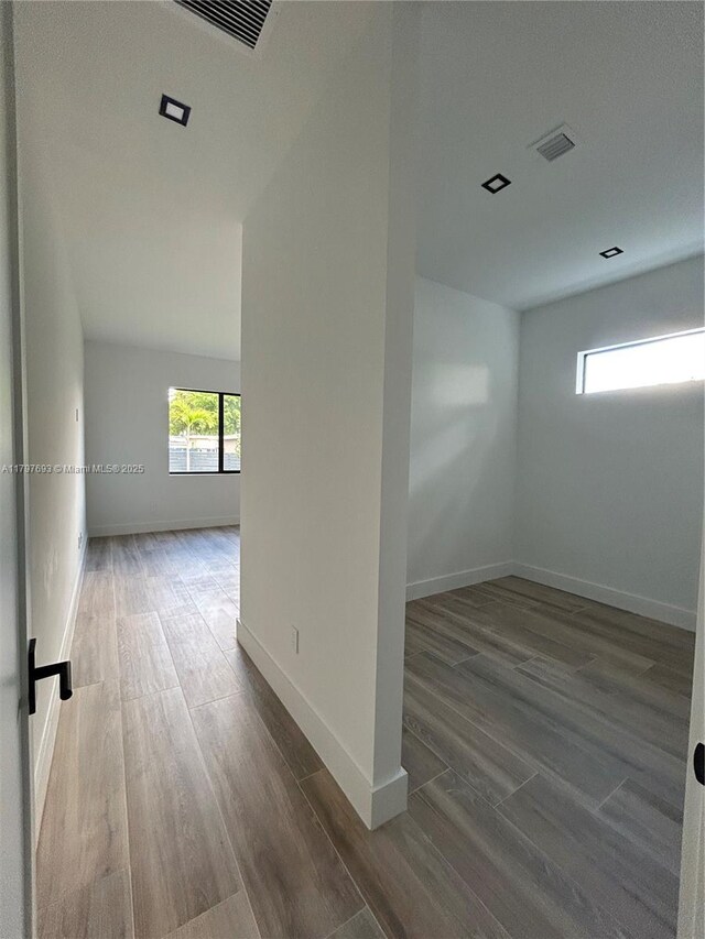 1611 SW 30th Ave, Fort Lauderdale, FL 33312 - spare room with baseboards, visible vents, and wood finished floors