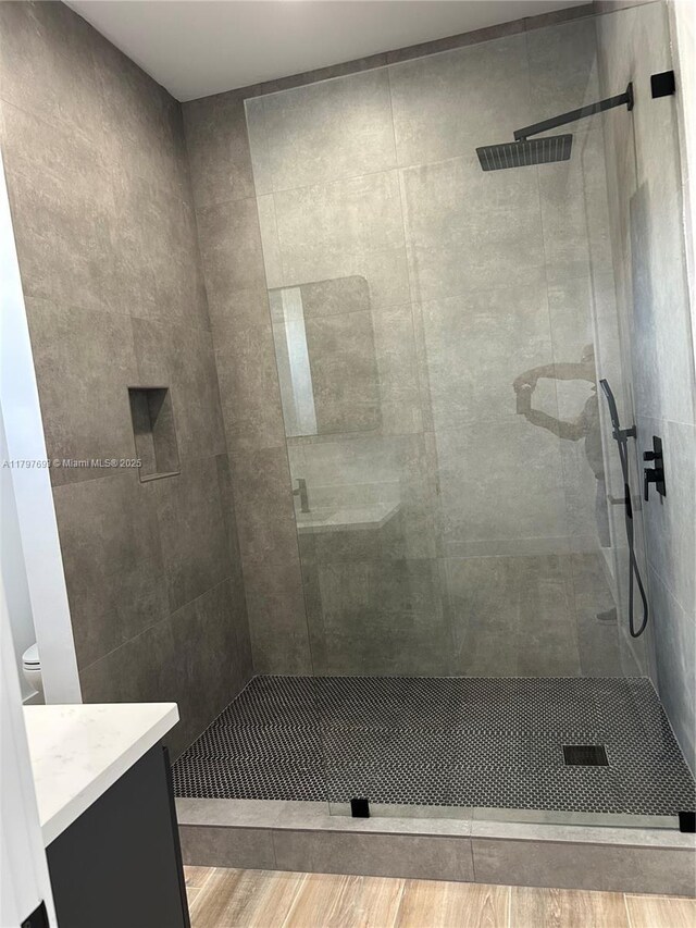 1611 SW 30th Ave, Fort Lauderdale, FL 33312 - full bathroom with a stall shower, vanity, toilet, and wood finished floors