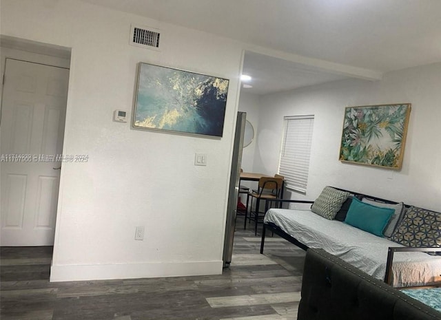 1860 NW 59th St, Miami, FL 33142 - living area featuring baseboards, visible vents, and wood finished floors
