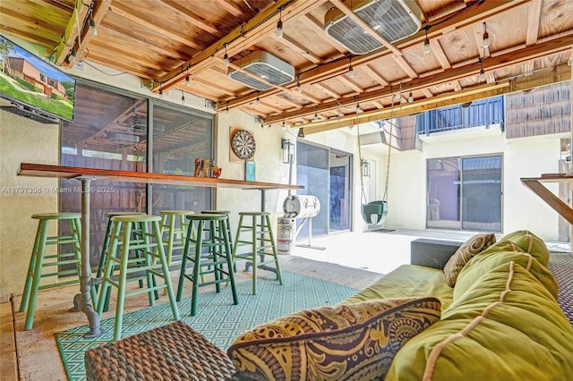 view of patio featuring an outdoor living space and outdoor dry bar