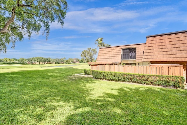 view of yard featuring fence