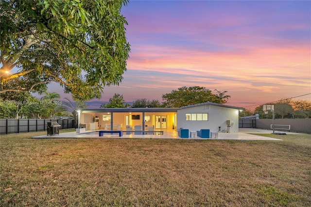 8501 SW 142nd St, Palmetto Bay, FL 33158 - back of house with a yard, a patio, a fenced in pool, and a fenced backyard
