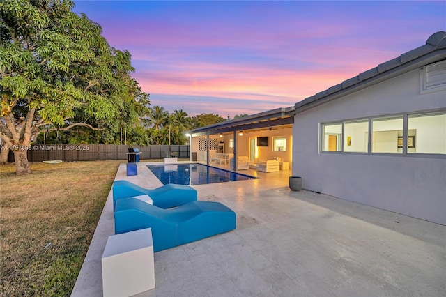 8501 SW 142nd St, Palmetto Bay, FL 33158 - pool at dusk with a patio area
