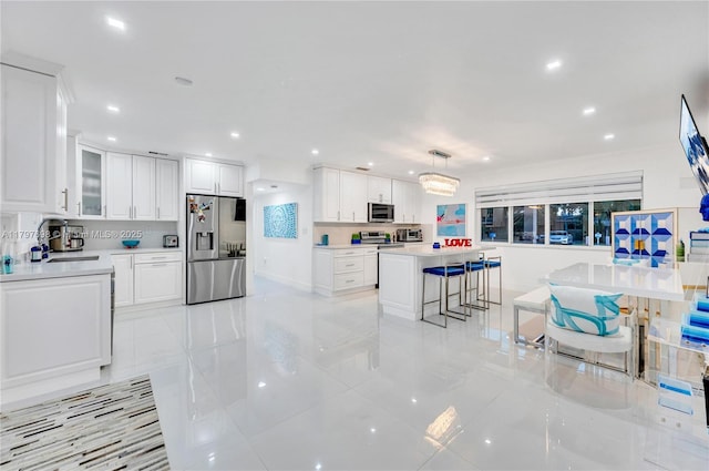 8501 SW 142nd St, Palmetto Bay, FL 33158 - living area featuring tile patterned flooring, visible vents, and recessed lighting