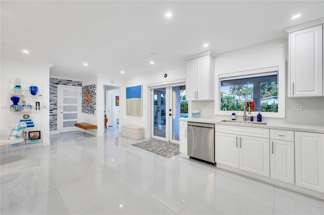 8501 SW 142nd St, Palmetto Bay, FL 33158 - kitchen with white cabinets, light countertops, stainless steel appliances, and a sink