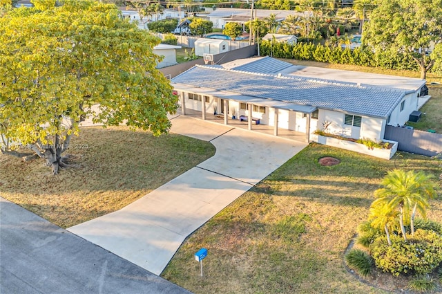 8501 SW 142nd St, Palmetto Bay, FL 33158 - ranch-style home with a tiled roof, covered porch, stucco siding, concrete driveway, and a front lawn