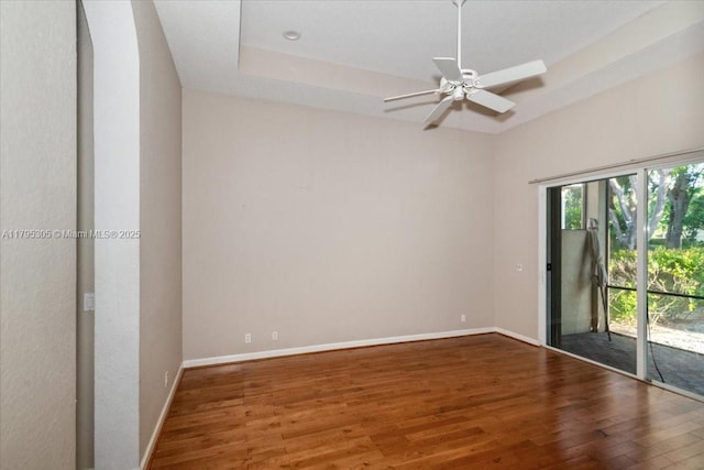 12471 NW 78th Mnr, Parkland, FL 33076 - unfurnished room with wood finished floors, baseboards, and ceiling fan