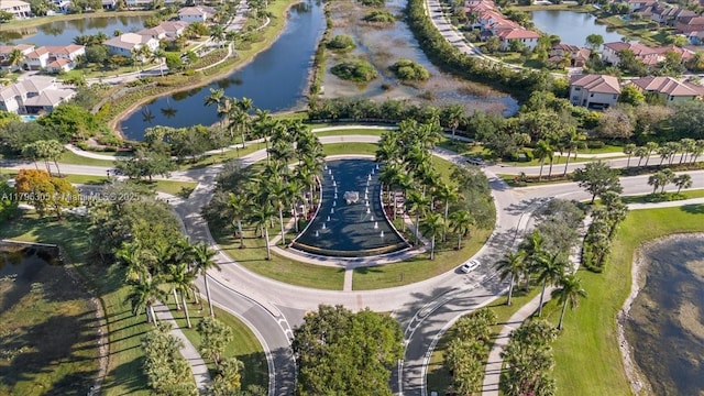 12471 NW 78th Mnr, Parkland, FL 33076 - aerial view of property and surrounding area featuring a large body of water and nearby suburban area