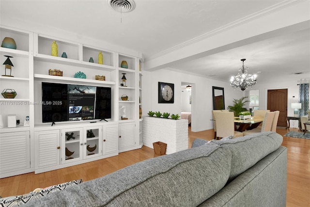 3921 Roosevelt St, Hollywood, FL 33021 - living area featuring a chandelier and wood finished floors