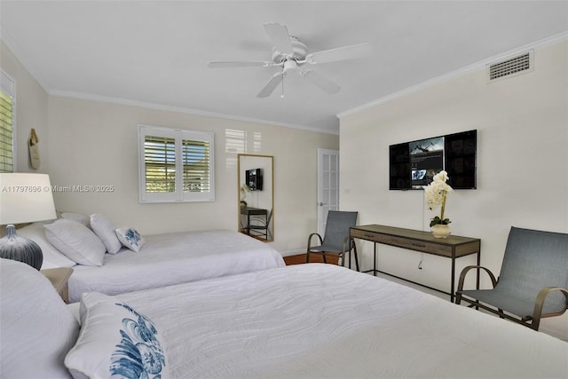 3921 Roosevelt St, Hollywood, FL 33021 - bedroom featuring ornamental molding, ceiling fan, and baseboards
