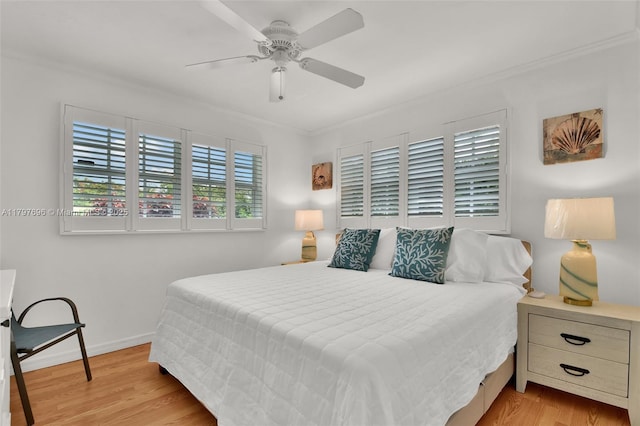 3921 Roosevelt St, Hollywood, FL 33021 - bedroom with ornamental molding, wood finished floors, baseboards, and ceiling fan
