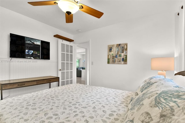 3921 Roosevelt St, Hollywood, FL 33021 - bedroom featuring ceiling fan and a wainscoted wall