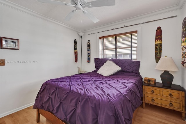455 Paradise Isle Blvd Unit 209, Hallandale Beach, FL 33009 - bedroom with light wood finished floors, crown molding, baseboards, and ceiling fan