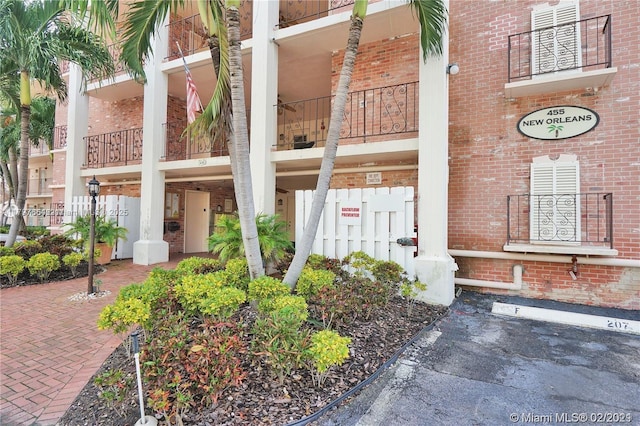 455 Paradise Isle Blvd Unit 209, Hallandale Beach, FL 33009 - view of property with uncovered parking