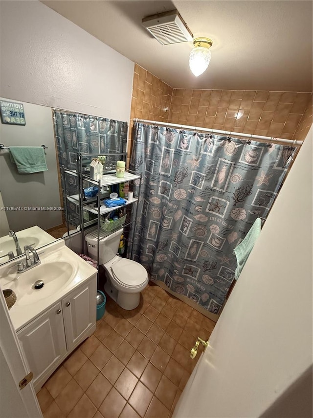 full bathroom with toilet, visible vents, a shower with shower curtain, tile patterned flooring, and vanity