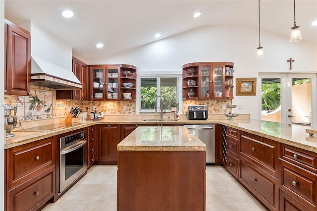 1254 Andalusia Ave, Coral Gables, FL 33134 - kitchen featuring appliances with stainless steel finishes, a sink, lofted ceiling, open shelves, and light stone counters