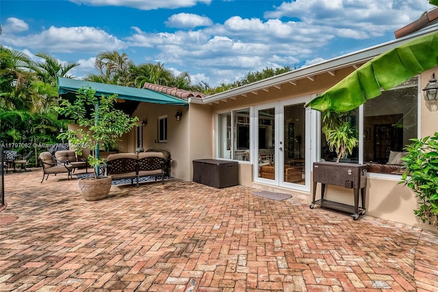 1254 Andalusia Ave, Coral Gables, FL 33134 - view of patio / terrace featuring an outdoor hangout area and french doors
