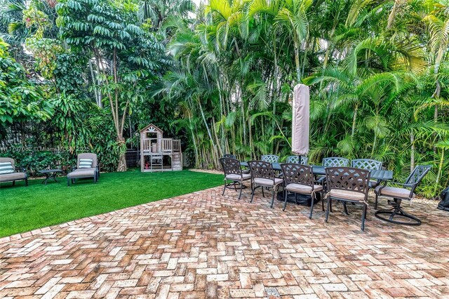1254 Andalusia Ave, Coral Gables, FL 33134 - view of patio featuring outdoor dining space