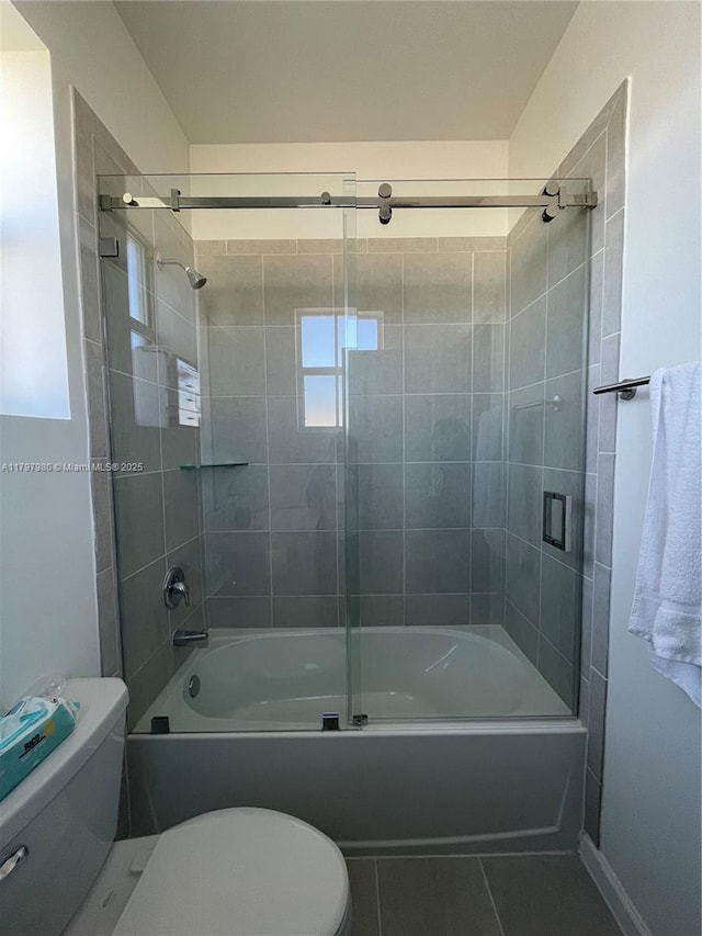 29196 SW 163rd Ct, Homestead, FL 33033 - full bath with toilet, tile patterned floors, and bath / shower combo with glass door