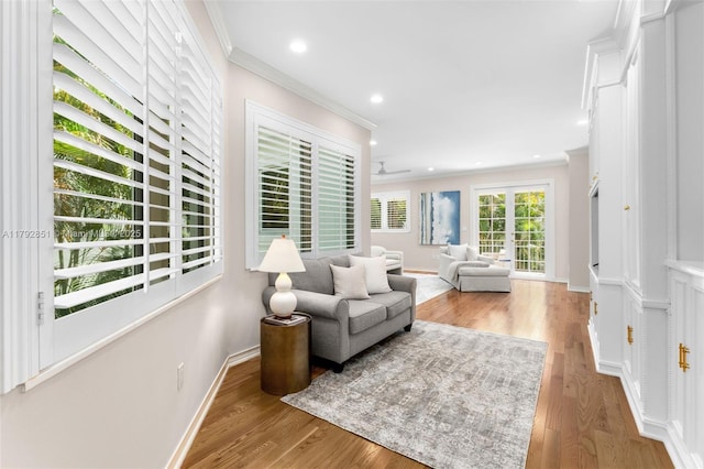 7251 SW 47th Ct, Miami, FL 33143 - living area with ornamental molding, light wood finished floors, baseboards, recessed lighting, and a ceiling fan