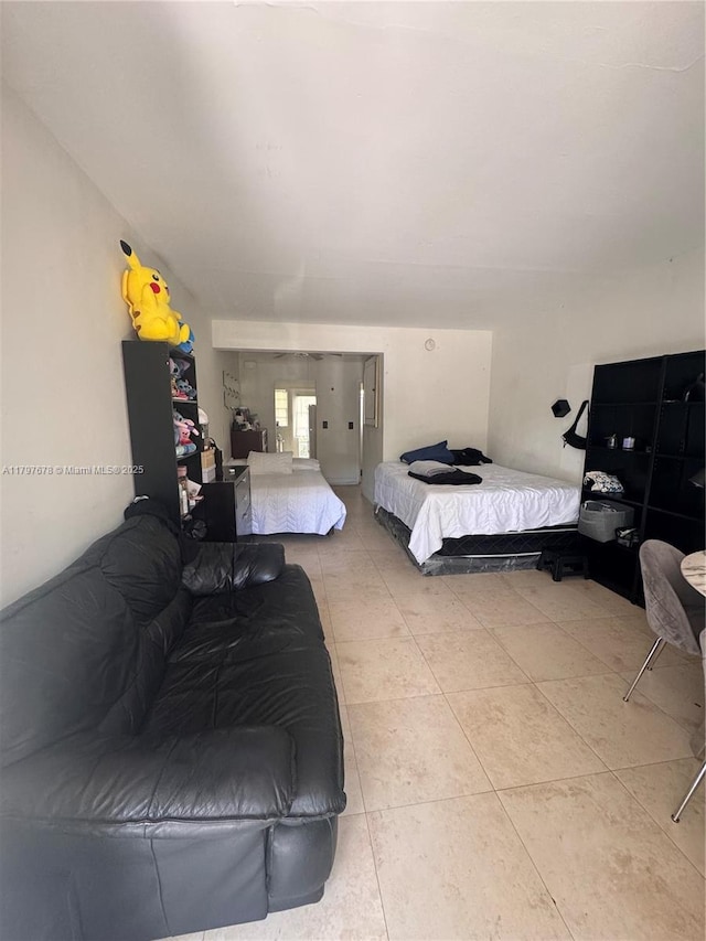 635 8th St Unit 103, Miami Beach, FL 33139 - bedroom featuring light tile patterned floors