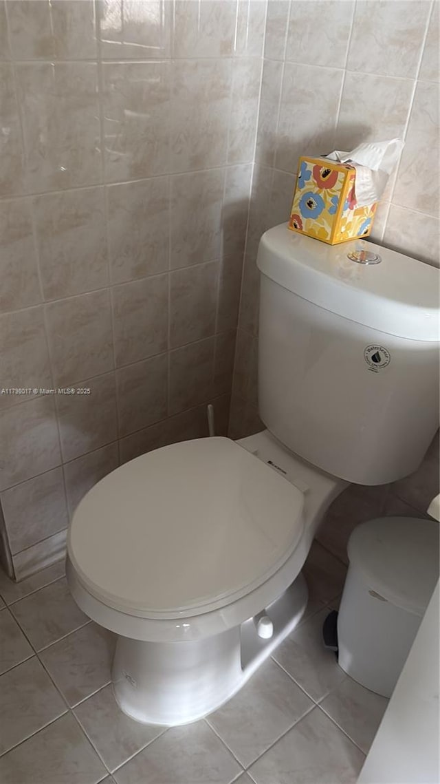 9225 Collins Ave Ph-C, Ph-C Surfside, FL 33154 - bathroom with tile patterned floors and tile walls