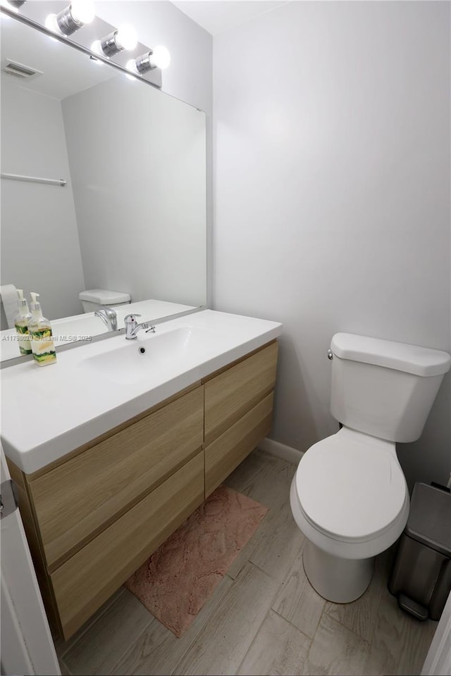 1985 S Ocean Dr Unit 21D, Hallandale Beach, FL 33009 - half bathroom featuring vanity and toilet