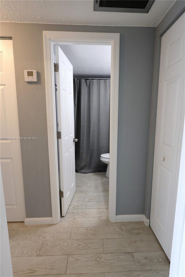 1985 S Ocean Dr Unit 21D, Hallandale Beach, FL 33009 - hallway with baseboards