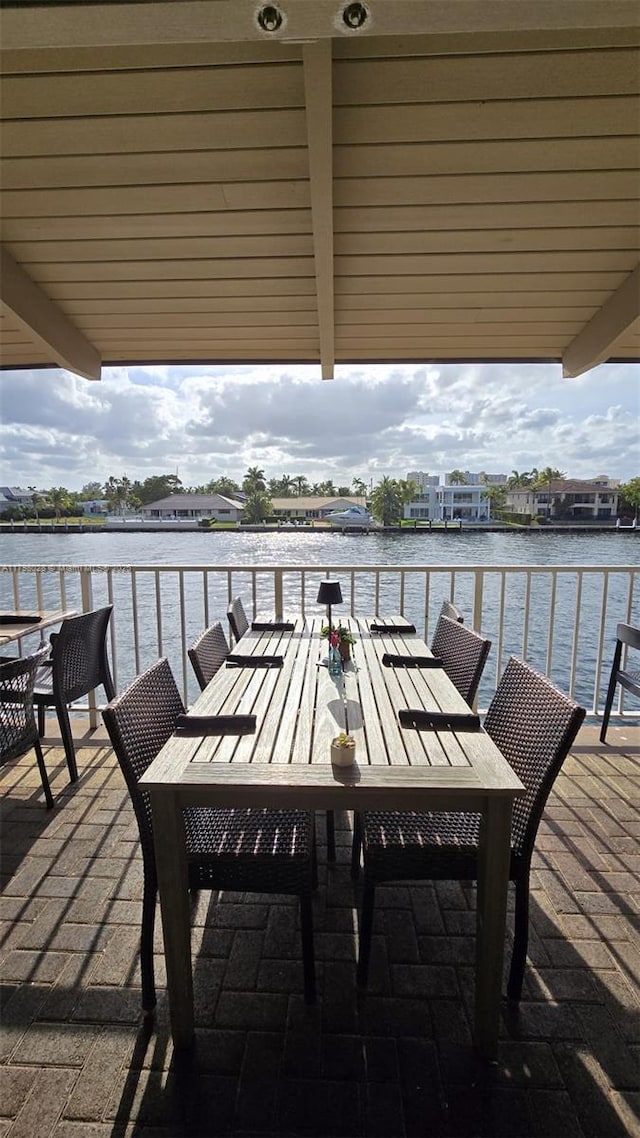 1985 S Ocean Dr Unit 21D, Hallandale Beach, FL 33009 - view of patio / terrace with a water view and outdoor dining area