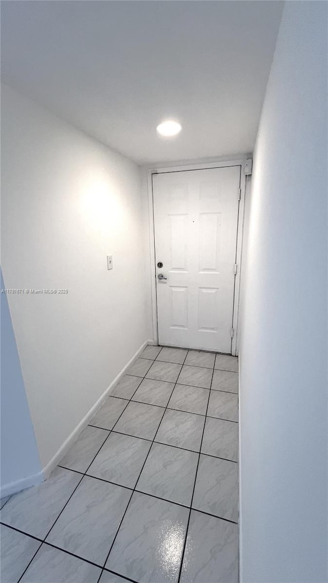 corridor with baseboards
