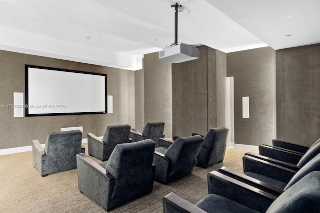 home theater with baseboards and carpet floors