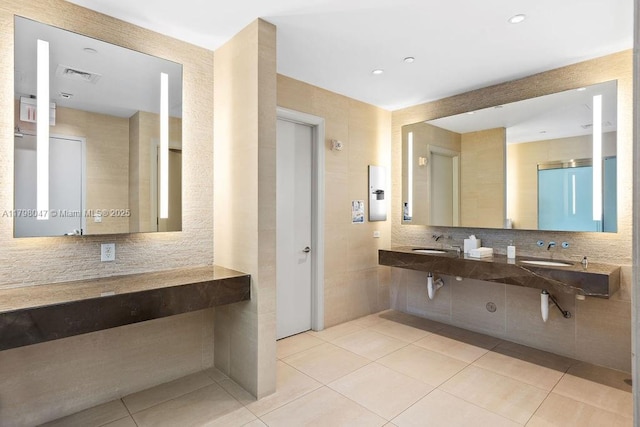 full bathroom with a sink, tasteful backsplash, visible vents, recessed lighting, and tile patterned flooring